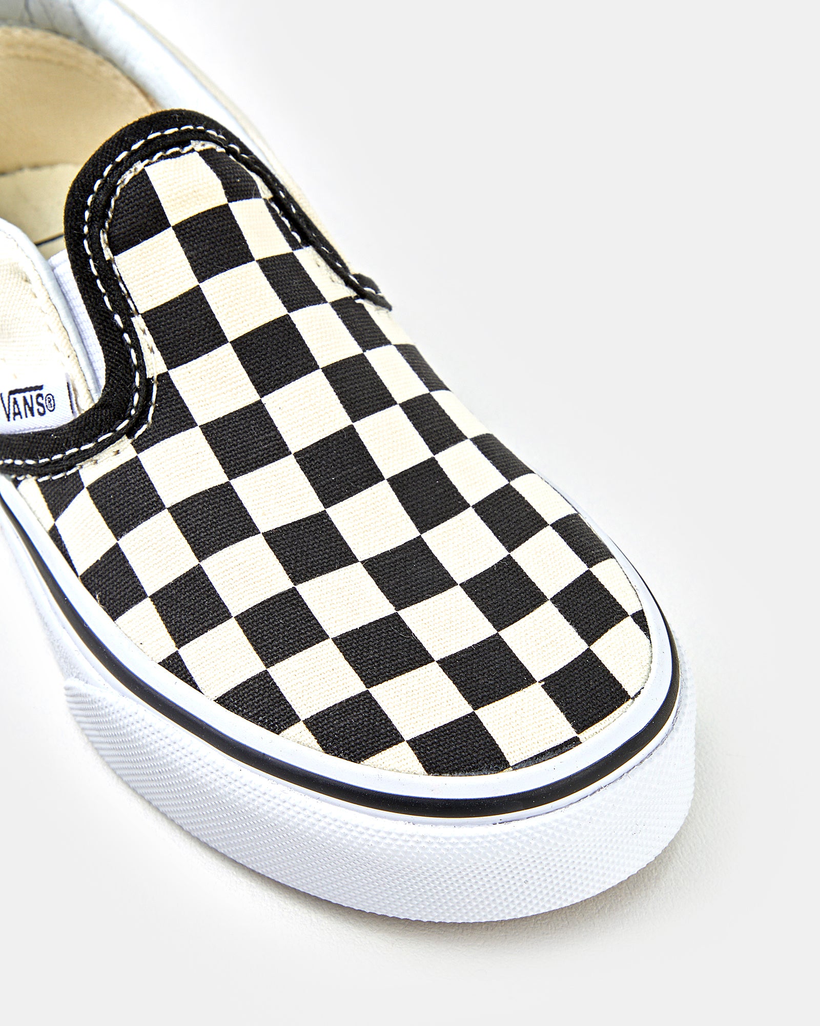 White vans slip ons hot sale youth