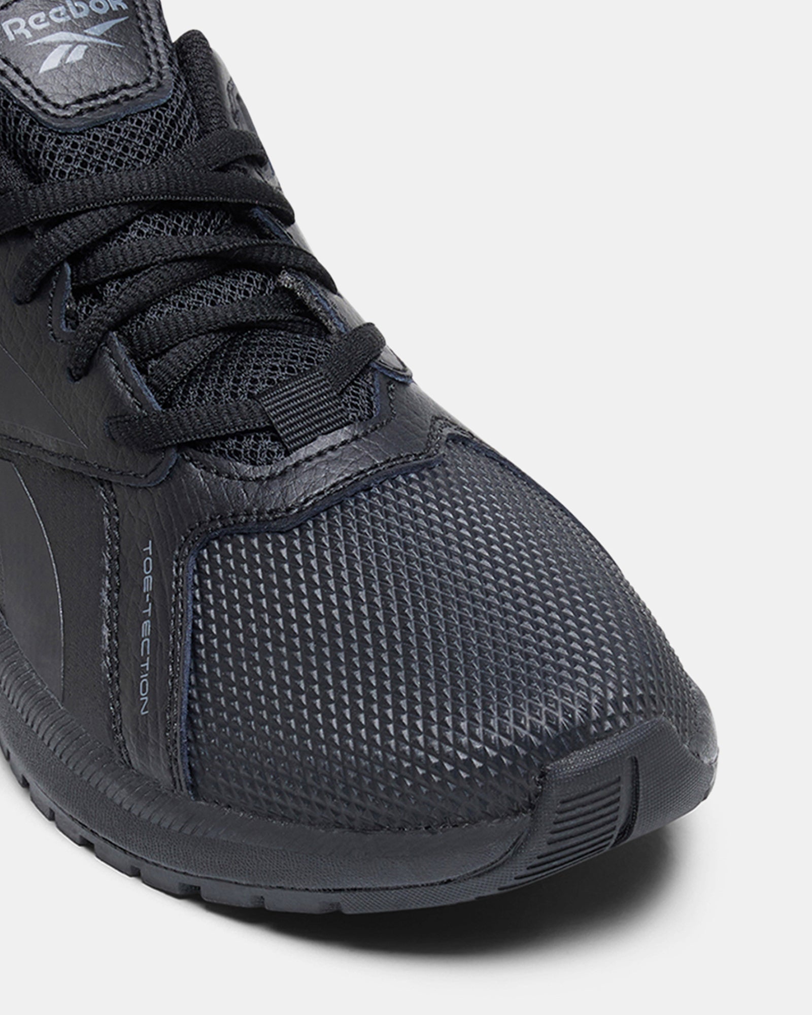 Black reebok school shoes on sale