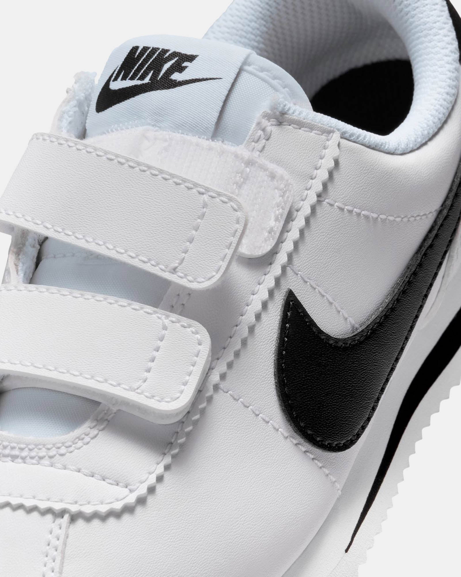 white nike shoes with velcro strap